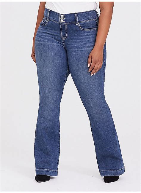 Torrid flare leggings - Matching style(s): Search 11621397 &nbsp; FIT Capri length.&nbsp; 21" inseam. MATERIALS + CARE Nylon/spandex. Wash cold; line dry. Imported plus size active swimwear. DETAILS Stretch waist. Mesh lining.
